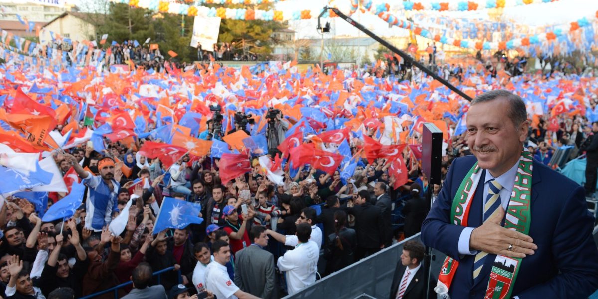 DIYARBAKIR, TURKEY - MARCH 27:  Turkish Prime Minister Recep Tayyip Erdogan greets crowd during a local election rally organized by the ruling Justice and Development Party in Diyarbakir, Turkey, on March 27, 2014. (Photo by Kayhan Ozer/Anadolu Agency/Getty Images)