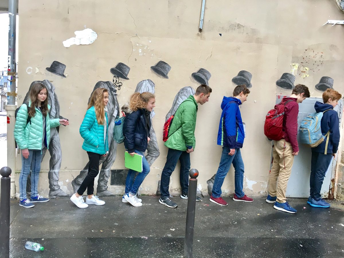 The eighth graders walk around Paris and enjoy the street art.