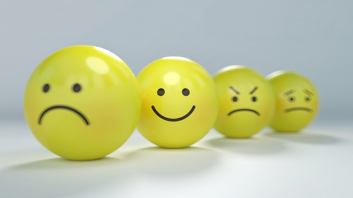 Four emoji-themed balls (AbsolutVision/Pixabay)