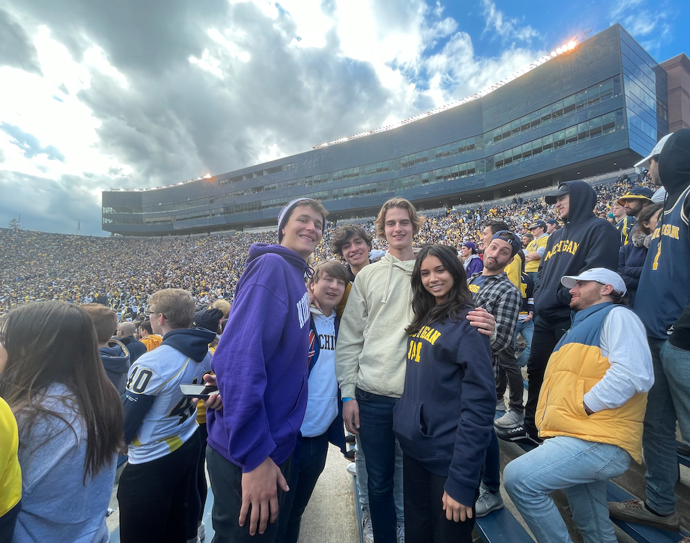 Saul Pink, WIS Class of 2021, at the University of Michigan for the Northwestern versus. University of Michigan game with WIS Class of 2021 alumni Jonas Tomkin and Diego Maldonado, who attend the University of Michigan, and Alex Gatti Roaf, who attends the University of Chicago (left to right) (Courtesy of Saul Pink).

