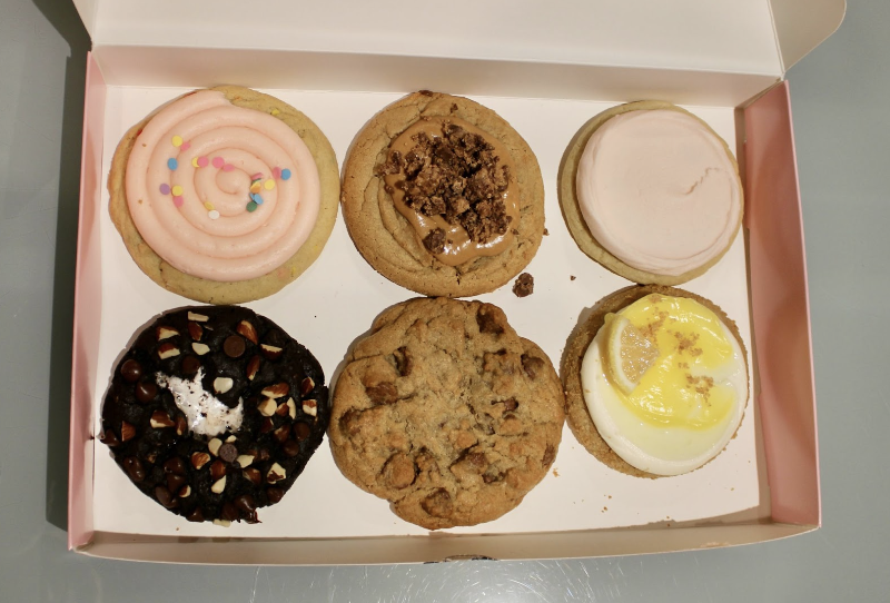 Crumbl Cookies’ weekly flavors from the week of Jan. 8. From top left to bottom right: Confetti Cake, Peanut Butter Cup Featuring REESE’s, Classic Pink Sugar, Rocky Road, Milk Chocolate Chip and Lemon Cheesecake. (Isabella Duchovny/International Dateline)