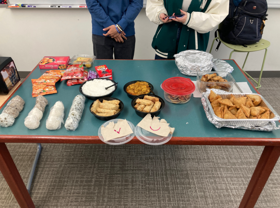 The food spread at ASUs first potluck. Members of the club brought an assortment of dishes from all over Asia. (Courtesy of Aarav Mithani)