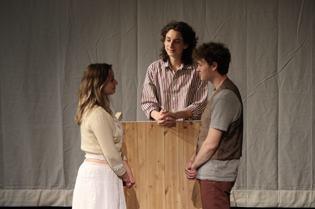 From left to right: Senior Bianca Pattison, freshman Leo Naftulin and senior Finn Porter portraying Emily Webb, Stage Manager and George Gibbs, respectively. (Courtesy of Cheryl Tanski)