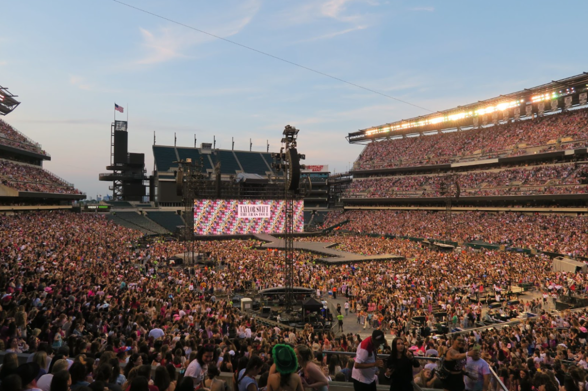 The+crowd+anticipating+the+appearance+of+Taylor+Swift+at+the+Eras+Tour+at+Lincoln+Financial+Field+on+May+12.+Taking+the+audience+along+a+journey+through+her+career-spanning+eras%2C+Swift+put+on+a+stunning+performance.+%28Naomi+Breuer%2FInternational+Dateline%29