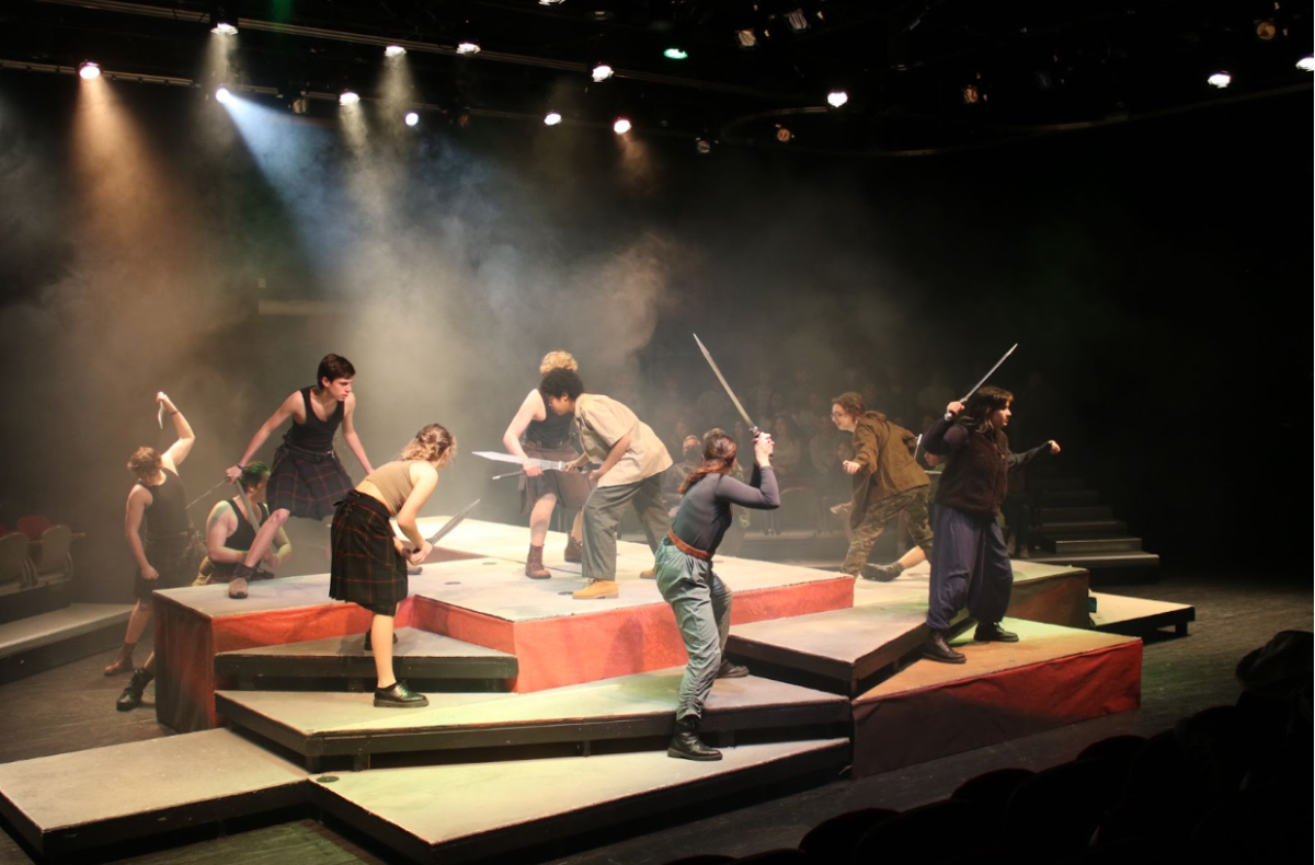 Upper school students performing in “Macbeth.” (Courtesy of David Wade )
