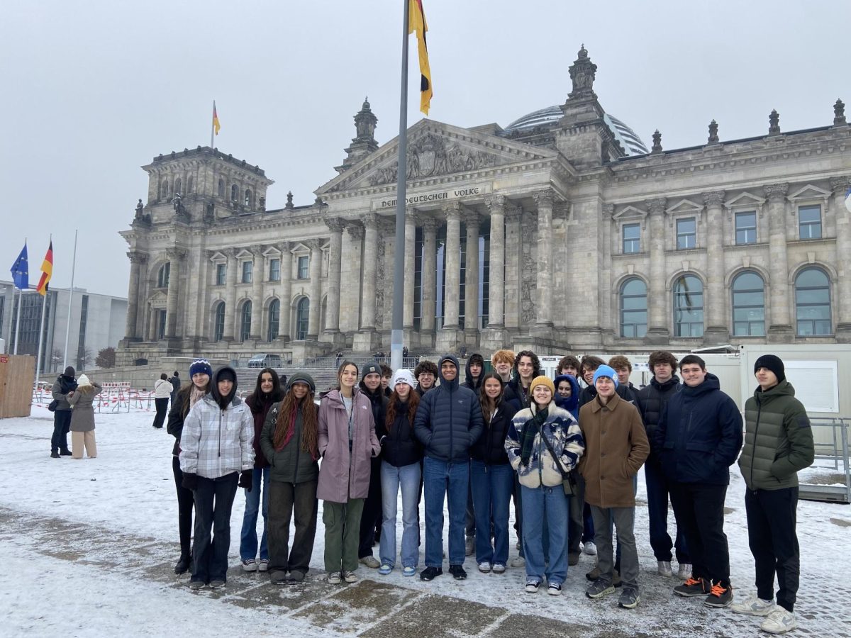 WIS students on the history trip pose in front of the Bundestag in Berlin. (Courtesy of Nora Brennan)
