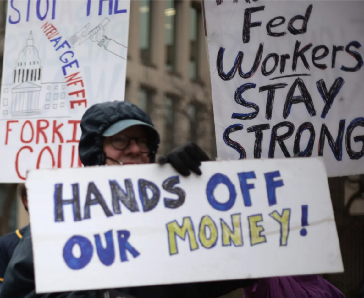 Protesters rally outside the Theodore Roosevelt Federal Building, home to the U.S. Office of Personnel
Management, on Feb. 5, 2025, in Washington (Alex Wong/Getty Images).