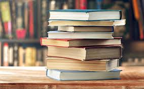 Textbooks stacked on top of each other (Creative Commons Attribution-Share Alike 4.0 International)